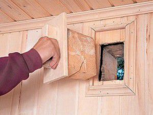 Cap of the ventilation inlet in a wooden house