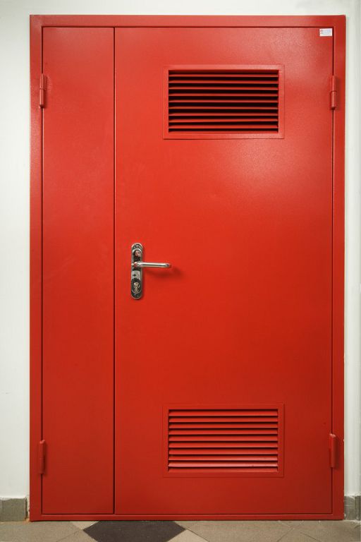 door to the technical room with ventilation grill